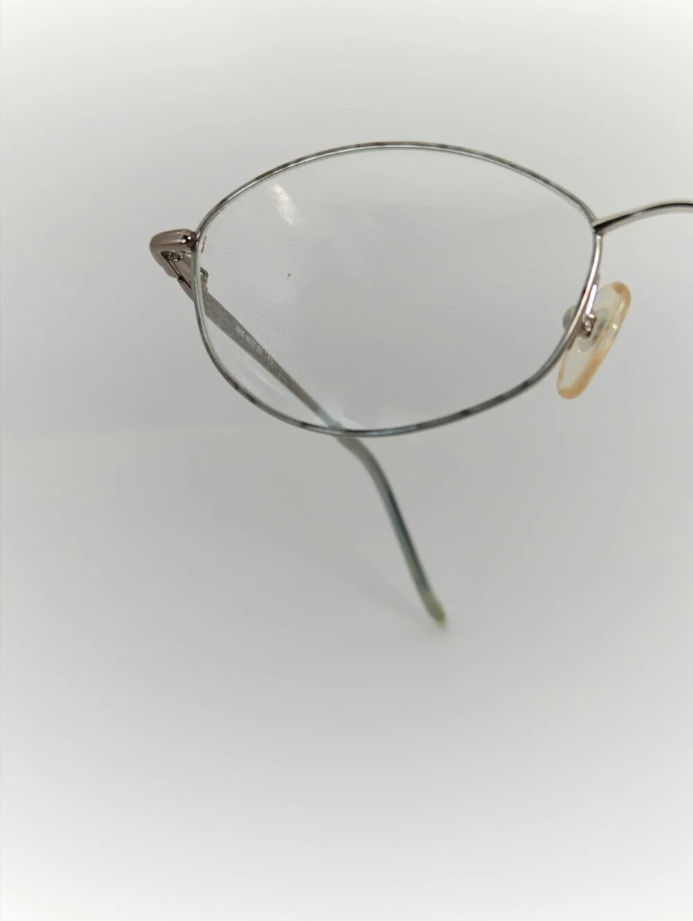 Nine West. 308. Silver Oval Wireframe. Ivory Grey Tortoise Front.